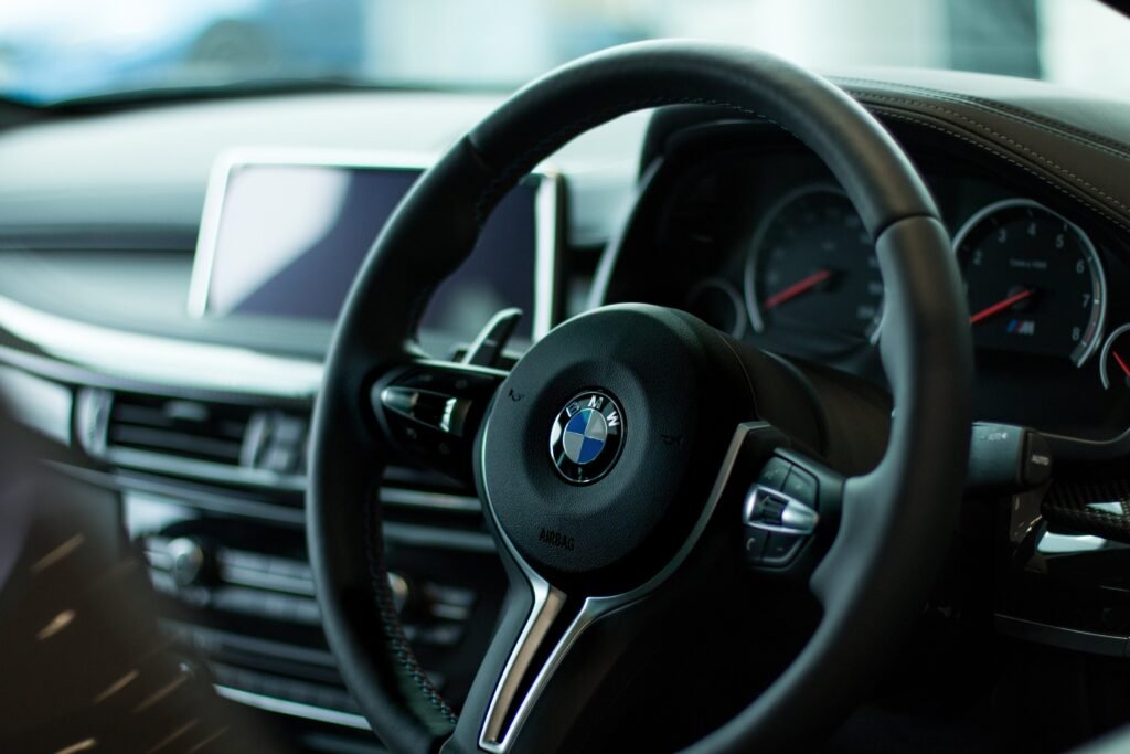 The steering wheel and instrument cluster of a BMW